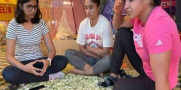 wrestlers sitting on the dharna